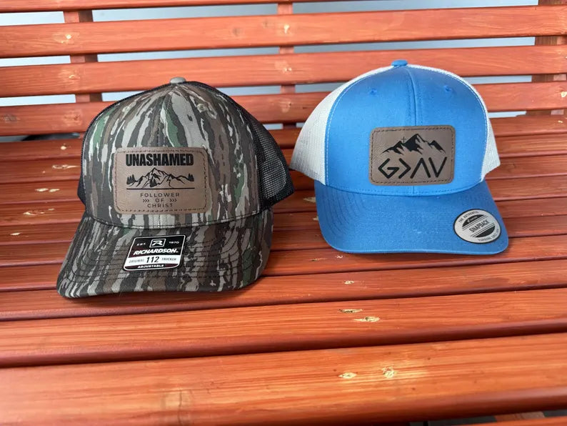 God is Greater than the Highs and the Lows Trucker Hat